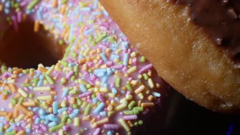 Delicious-glaze-donut-homemade-tasty-mixed-sprinkles-toppings-sweet-food-close-up