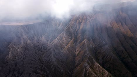 the shivering majesty of mount bromo's active volcano, a dangerous and myterious mountain in east java, aerial 4k footage