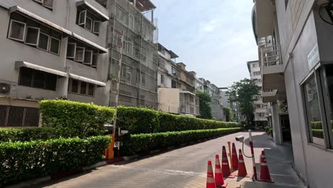 vehicle moves through a quiet city street.