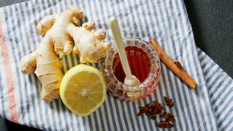 Ginger-with-lemon-and-honey-in-jar-4k