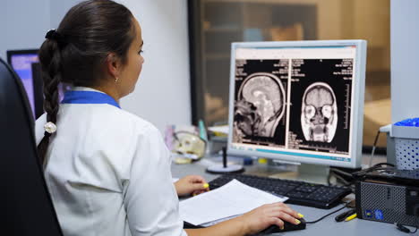 doctor reviewing brain scan