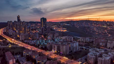 Ankara-moving-time-lapse-by-sunset-with-rush-hour-traffic,-cars-and-skyscrapers-from-a-drone