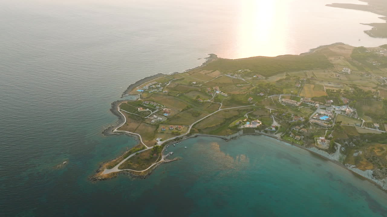 Aerial View of a Coastal Village at Sunset