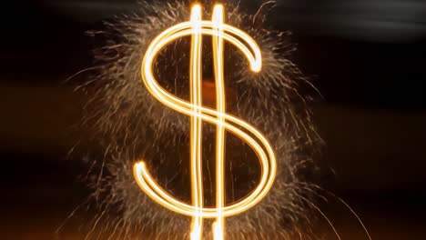 A Stunning Display of Sparklers Shaping the Iconic Dollar Sign Symbolizing Wealth, Prosperity, and Financial Success in a Captivating Nighttime Scene