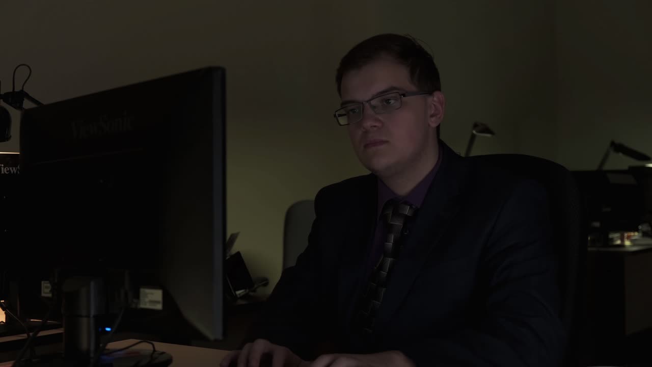 Man working late at night on computer