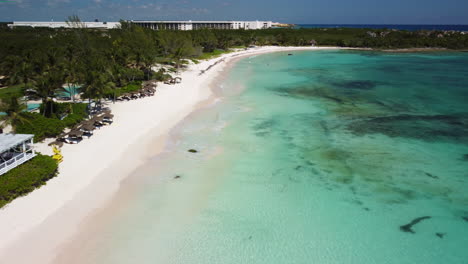 crystal clear turquoise water and white sand