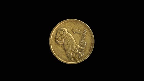 greece 1973 1 drachma coin reverse with little owl of athena rotating on black background