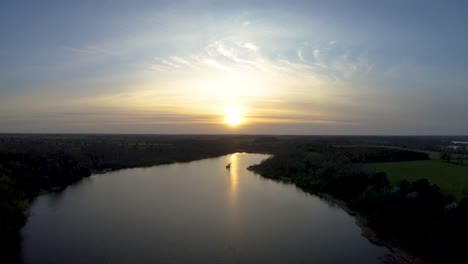 aerial footage of a sunset over a norfolk broad