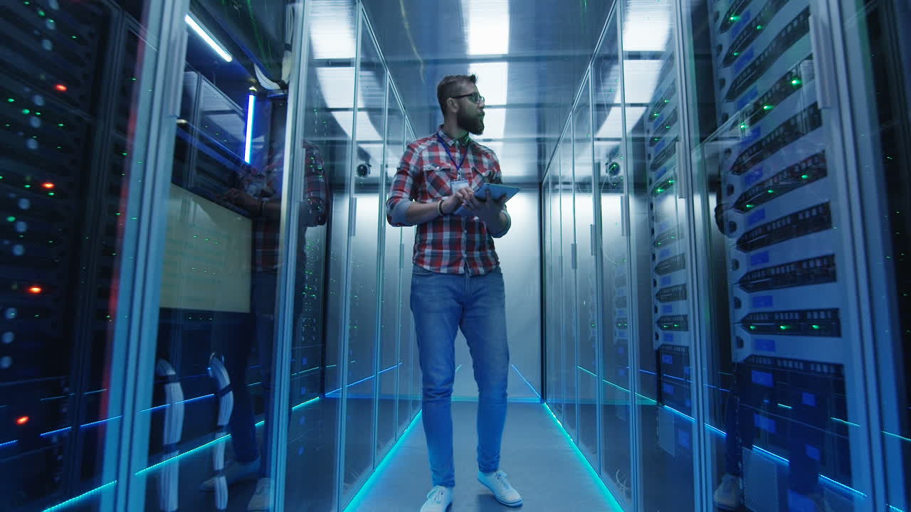 IT Technician Working in a Modern Data Center
