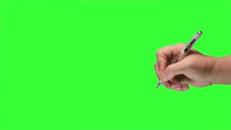 hand writing on green screen. hand writing with a pen on a green screen background.