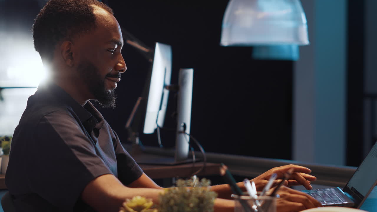 Office worker analyzing executive data report on laptop