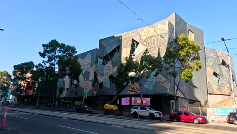 street view of acmi building with cars