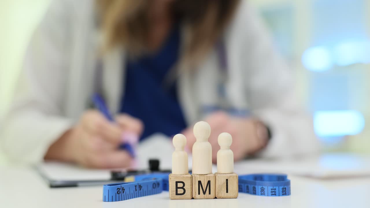 Medical consultation focused on BMI and body mass index measurement