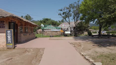 Traditional-thatched-roof-ticket-booth-at-entrance-to-Naganeupseong-Folk-Village