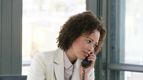 successfull businesswoman talking on the phone