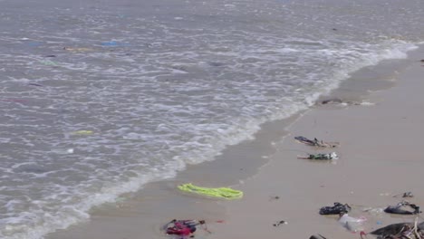 pollution due to plastic carrybags location - malpe beach, ka, india