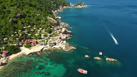 aerial view of south of koh tao island in thailand south east asia diving paradise drone revealing coastline with pristine ocean water and coral reef