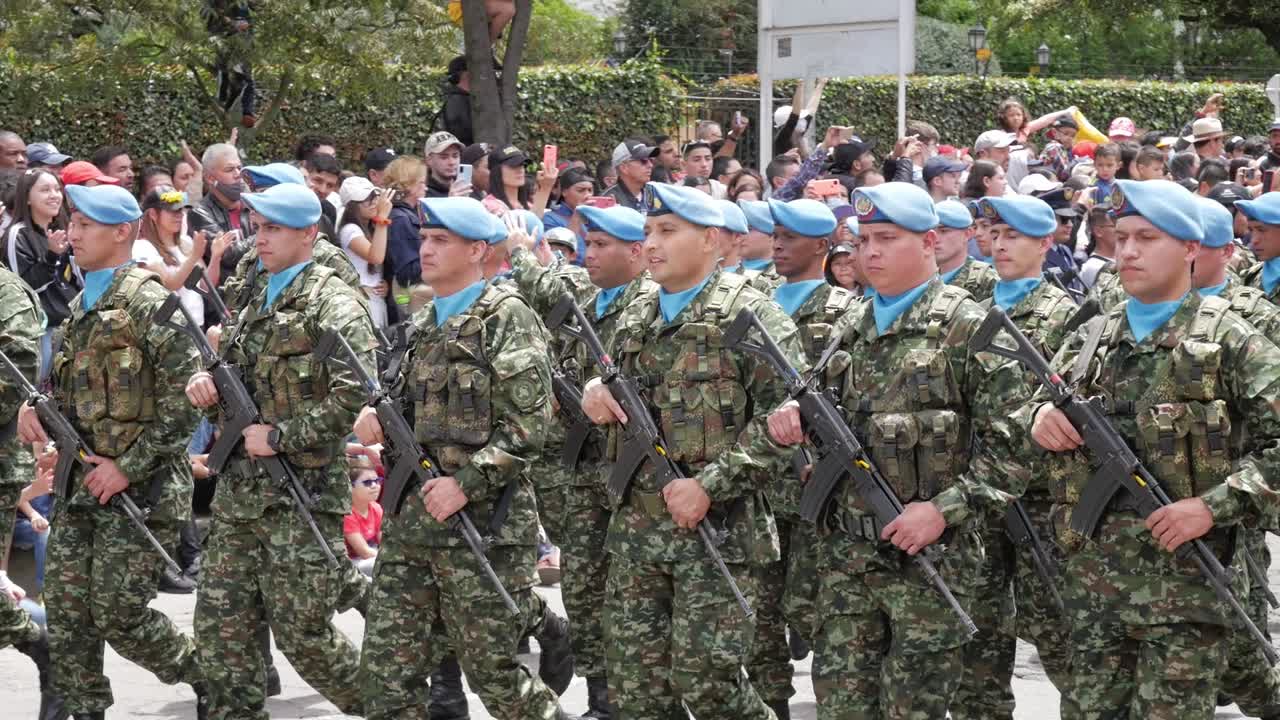 Colombian soldiers with light blue berets. Military parade. Independence day, July 20th.