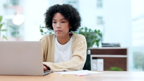 Laptop,-documents-and-a-business-woman