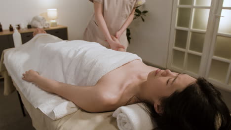 woman receiving a relaxing foot massage at a spa