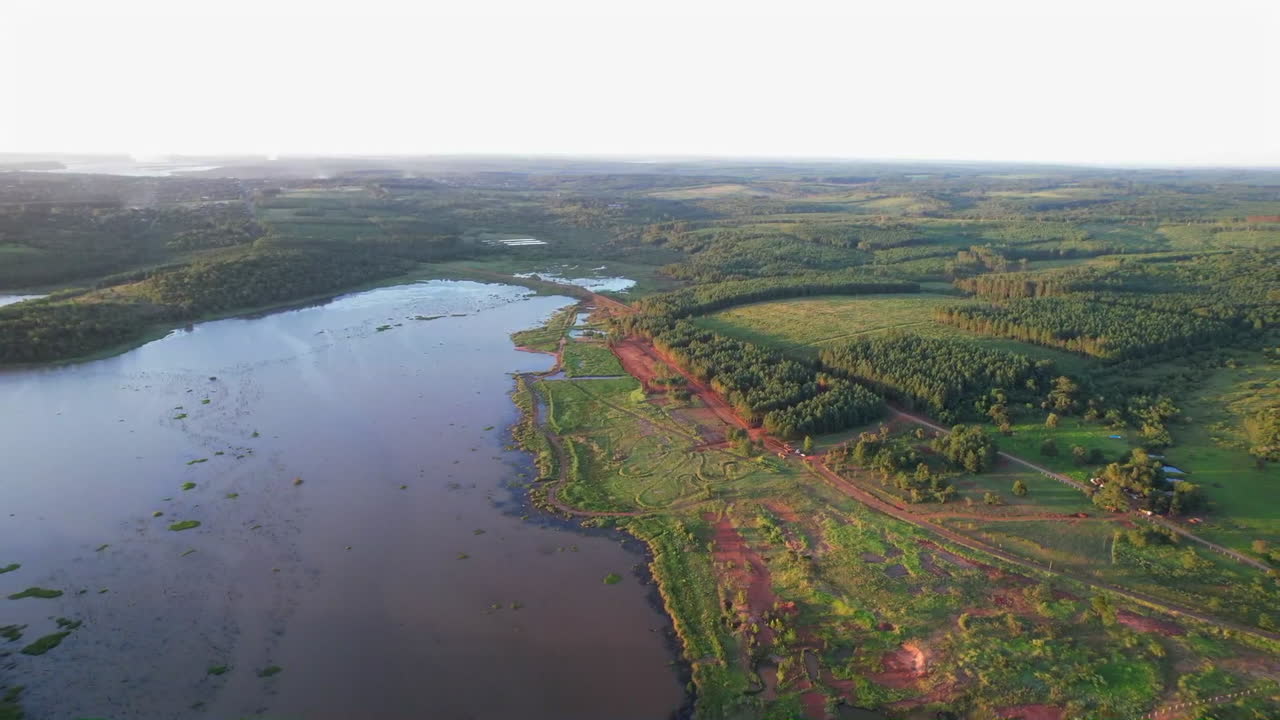 Lush green forest and Yabebiry river in San Ignacio, Misiones seen from above
