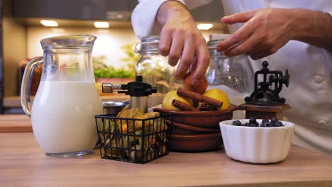 the cook arranges the ingredients on the kitchen counter