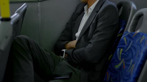 business commuter sleeping while travelling in bus 4k