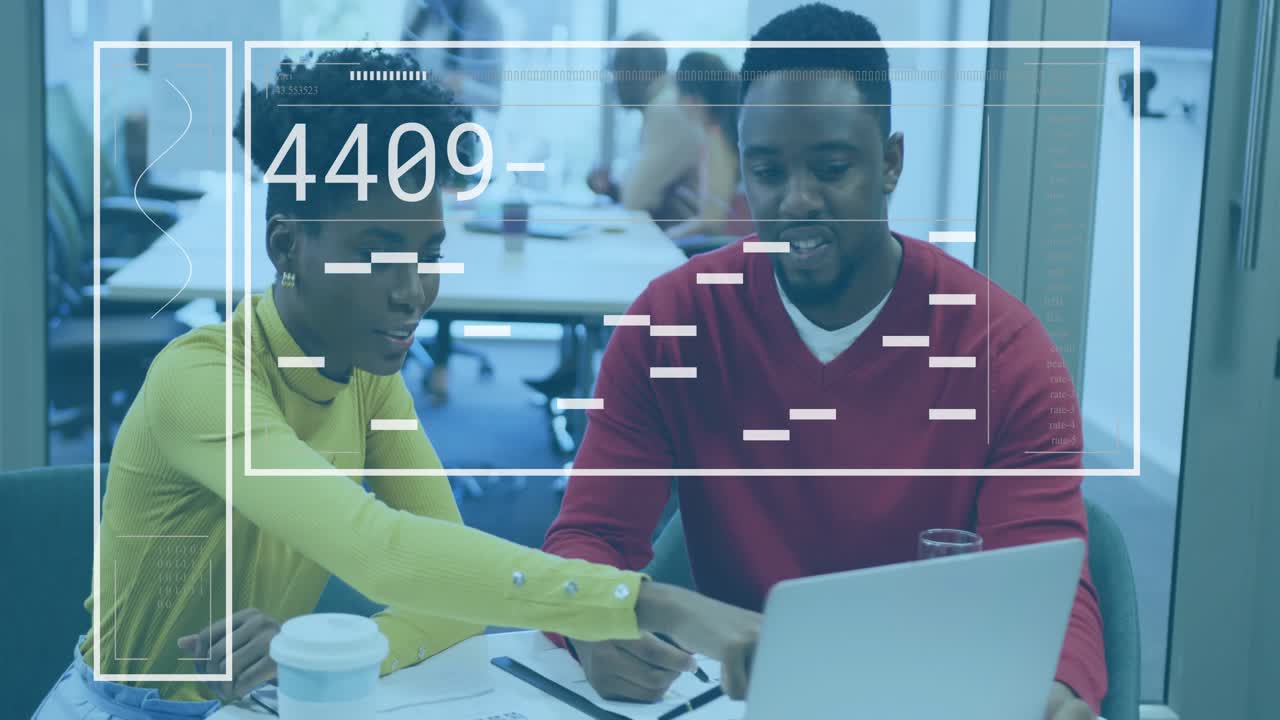 Man jotting notes and woman pointing laptop screen as scanning overlay updating codes for business
