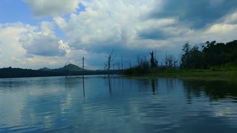 Peaceful-serene-scene-of-a-remote-lake-on-a-cloudy-day-with-a-light-breeze-blowing