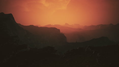 dramatic-sky-over-rocky-mountains-at-sunset