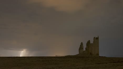 ruins of castle against stormy sky