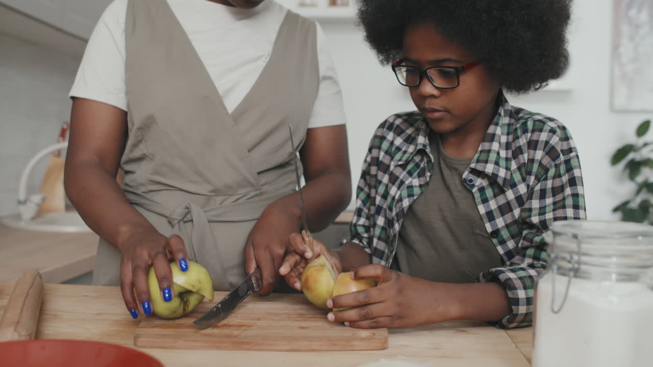 Mother and Son Cooking Apple Pie Together