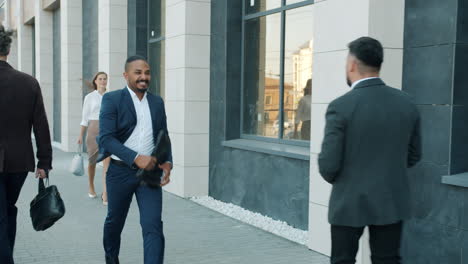 business people walking outside an office building