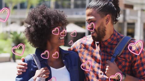 video of falling hearts over biracial couple in the street