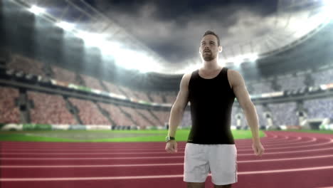 atleta masculino calentándose en un estadio
