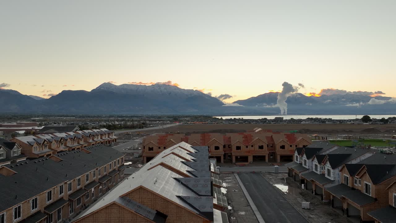 Aerial Flyover Of A New Housing Construction Project Revealing Farmland In Saratoga Springs, Utah, USA
