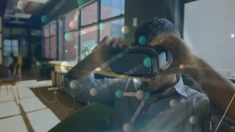 Man-wearing-a-virtual-reality-headset-while-seated-on-a-chair