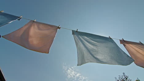 clothes drying on a clothesline under the sun