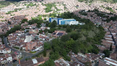 experience medellín, colombia, through an aerial view capturing its vibrant cityscape, surrounded by the majestic andes mountains and lush greenery. perfect for cultural and travel-focused projects.