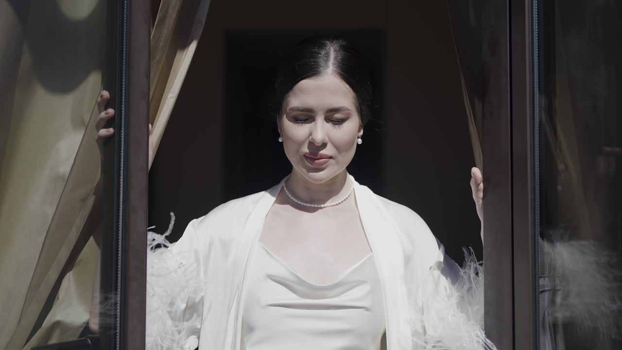 Woman at a Window in a Vintage Robe