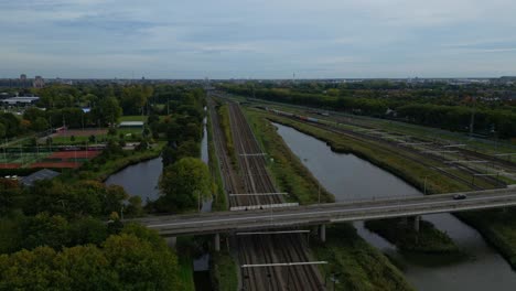 aerial ascending shot view over railway lines leading to kijfhoek classification yard with bridge