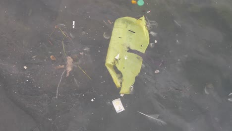 yellow bag, garbage in the sea