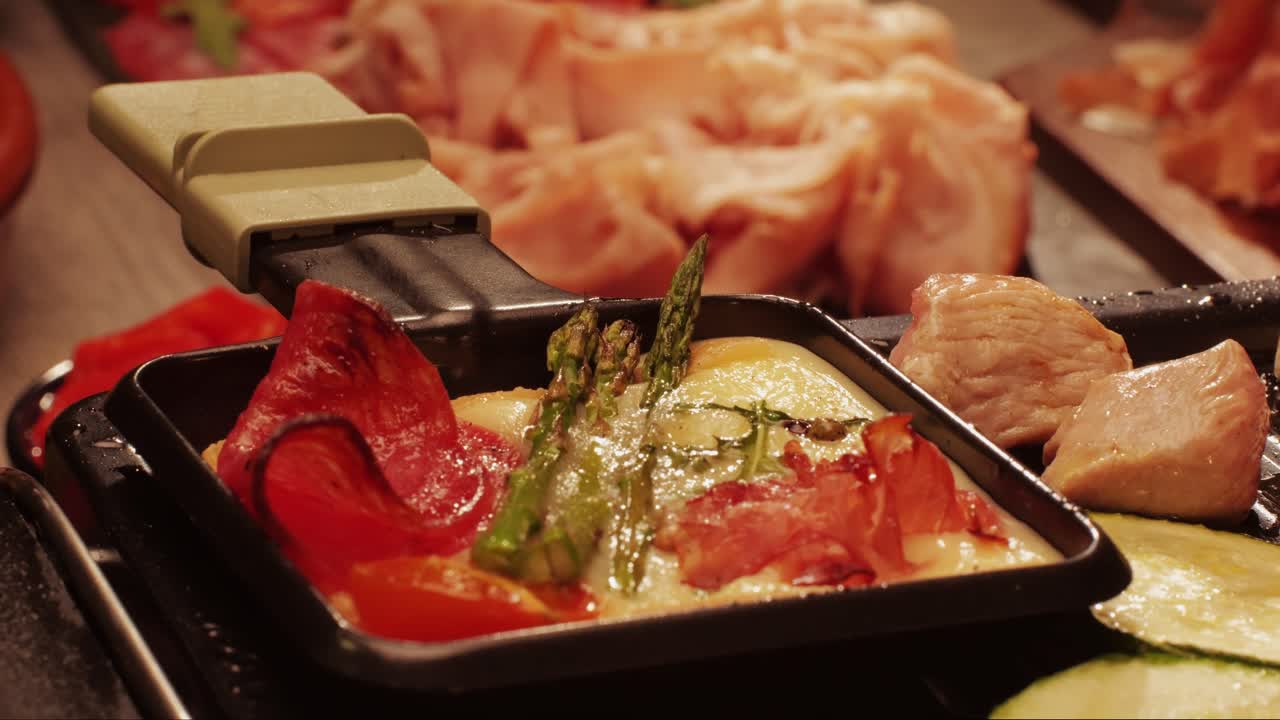 French Swiss or Spanish restaurant with traditional tapas food, Spanish cuisine, delicious tapas and cheese plate, bruschetta with cheese, olives dry tomatoes and tasty sandwich bar appetizer, buffet