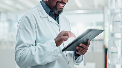 scientist using tablet in laboratory