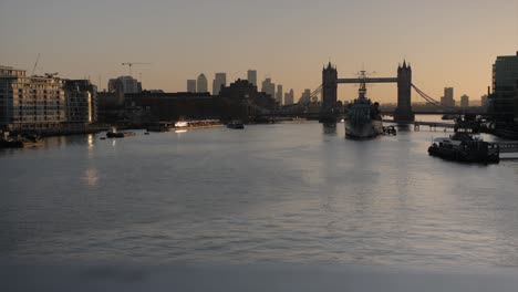 view of tower bridge from london bridge at sunrise