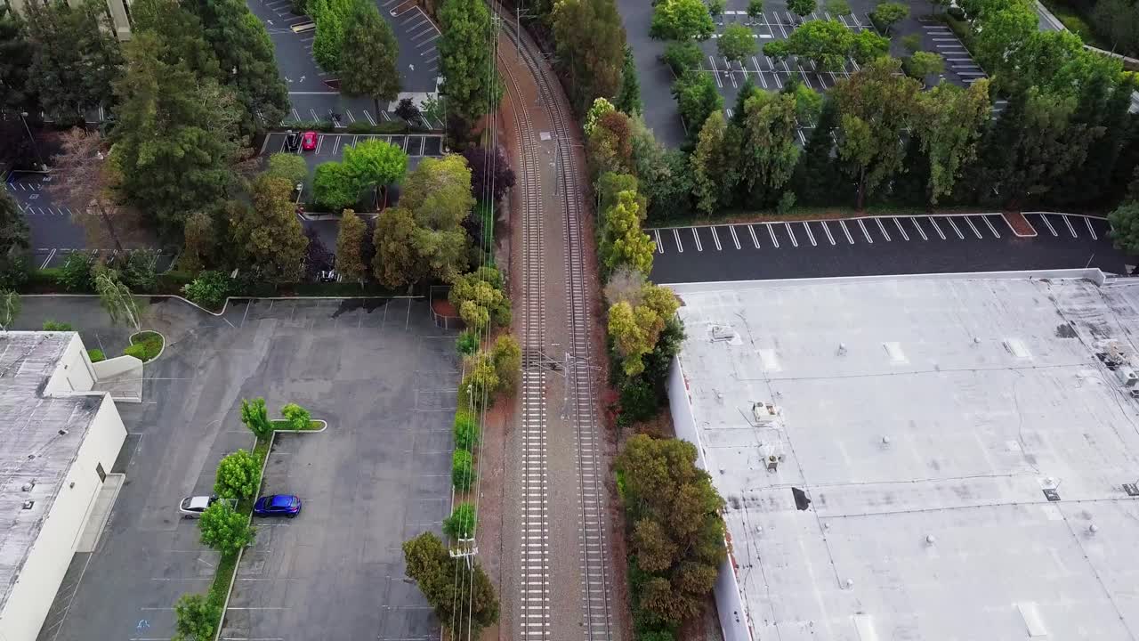 Aerial of train rails intersections bridge near NASA in mountain view California