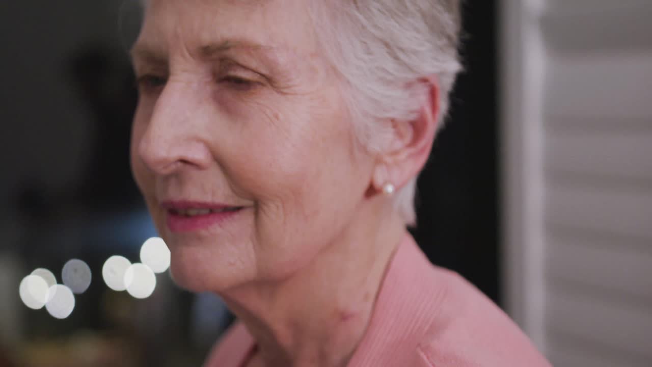 Senior Caucasian woman smiling and looking at the camera