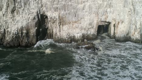 sheer limestone cliffs of piedra de la iglesia in southern chile