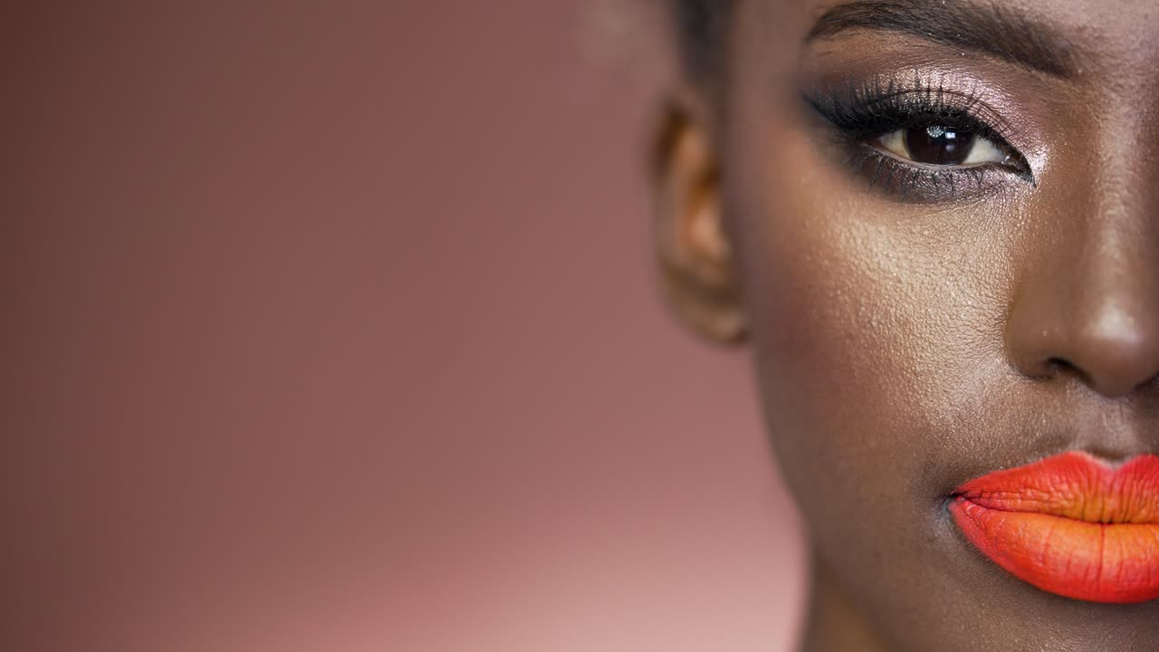 Close-up portrait of a woman with vibrant makeup