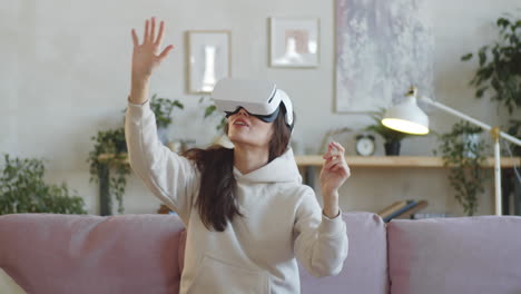 excited woman experiencing augmented reality with vr headset